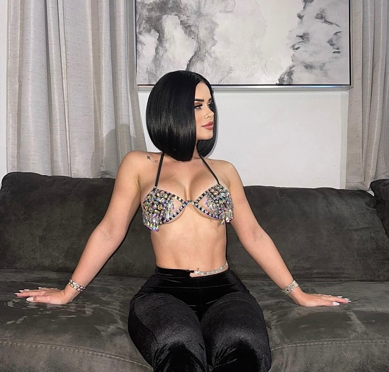 Elegant two-piece outfit is embellished with rhinestones