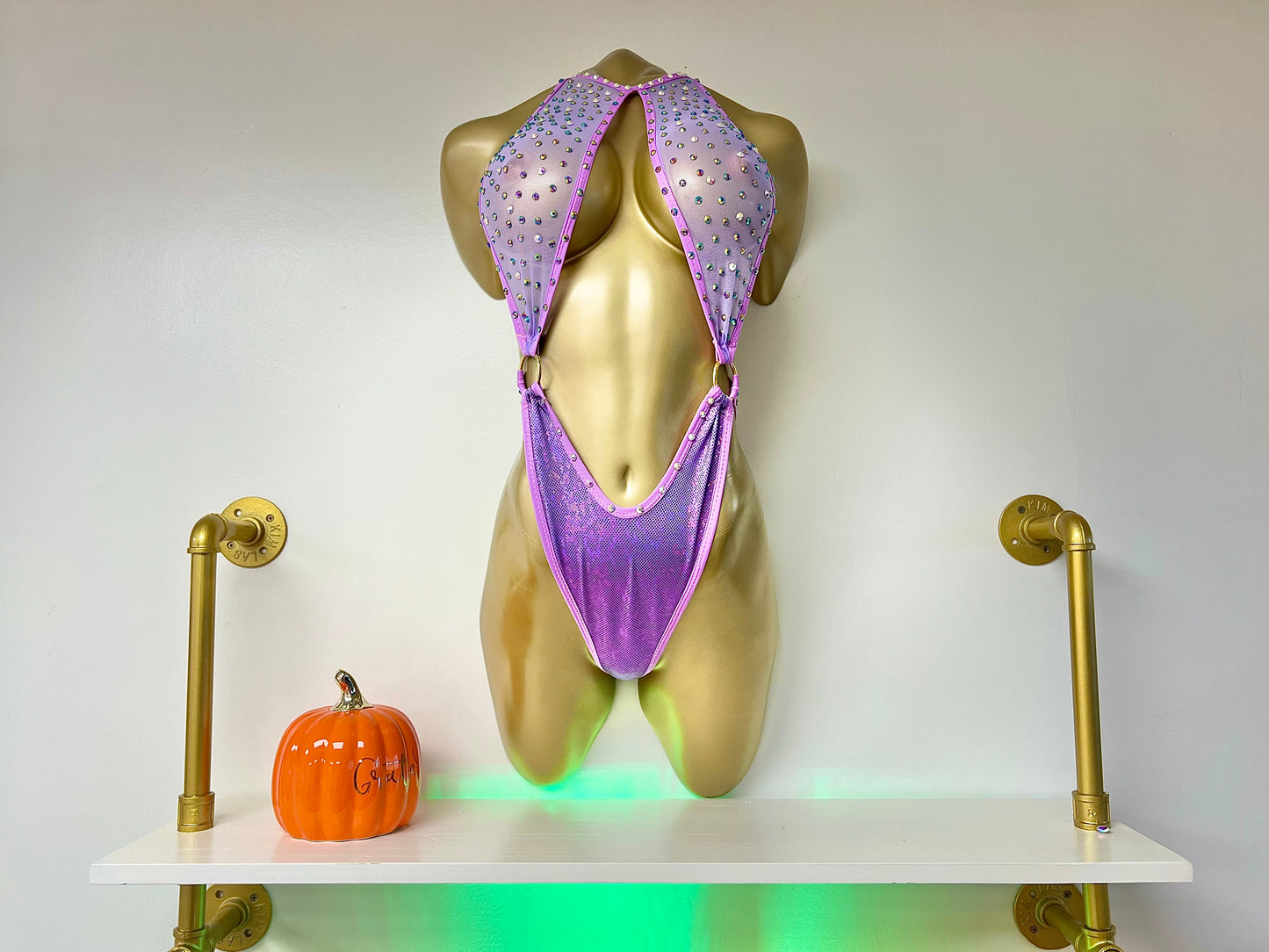 This medium-sized gem is adorned with dazzling rhinestones, making it the most attractive piece in your wardrobe.